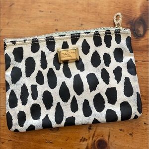 Marc by Marc Jacobs spotted-print clutch with brass accents. Vintage vibes!